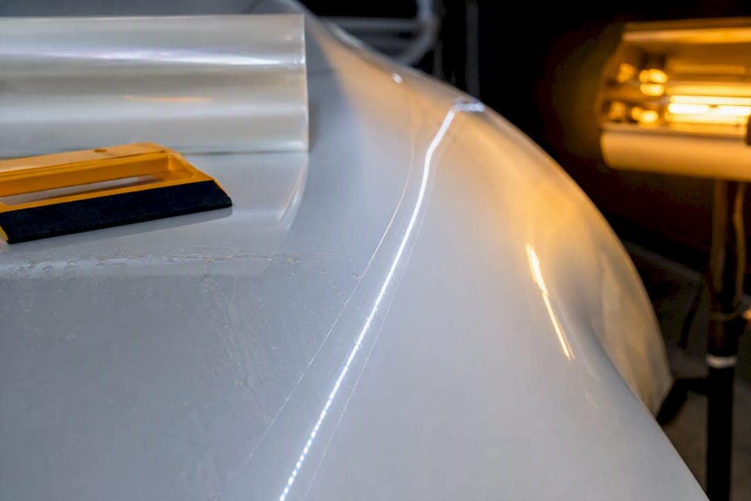 Clear PPF applied to white vehicle panel