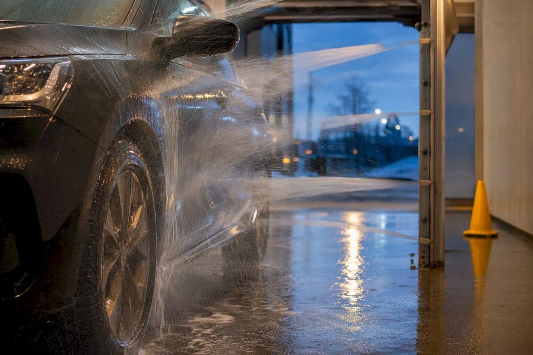 Touchless wash spraying an anonymous vehicle