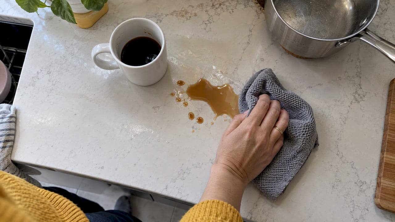 Coffee spill being wiped from filmed quartz
